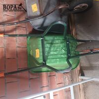 Groene pvc kruiwagen – kavel bij BOPA Auctions, Poperinge