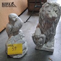 Betonnen tuinbeelden leeuw en roofvogel - 2 stuks – kavel bij BOPA Auctions, Aarsele