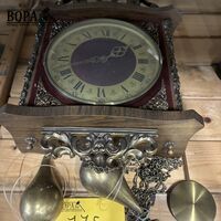 Wandklok met koperen gewichten – kavel bij BOPA Auctions, Oekene